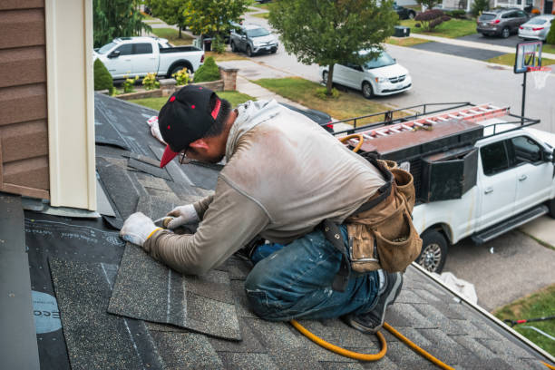 Professional Gutter Repair And Installation technician working in Bettendorf, IA